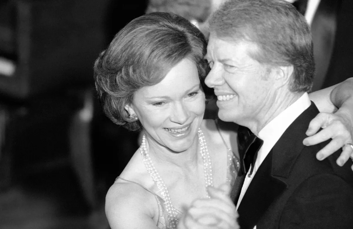 President Carter and First Lady Rosalynn Carter dance at the annual Congressional Christmas Ball at the White House in 1978 in Washington, D.C. (Ira Schwarz / Associated Press)