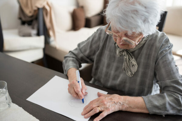 Image of elderly lady undergoing cognitive testing